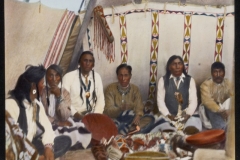 Seven-Indian-men-seated-inside-highly-decorated-tipi-McClintock-800-596